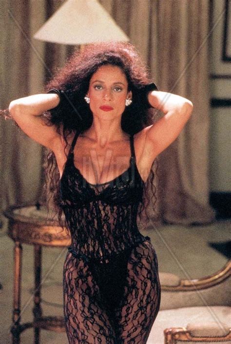 sonia braga serving sex siren in a black lace number