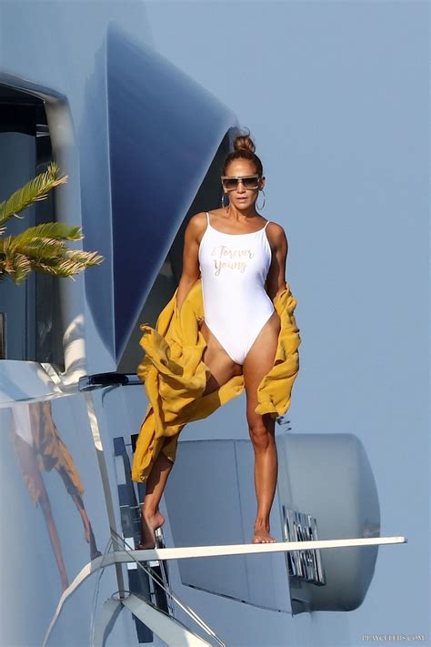 Jennifer Lopez Paparazzi Sexy And Tight Swimsuit Photos