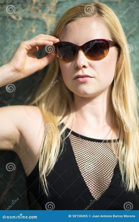Portrait Of Young Blonde Woman Wearing Sunglasses Stock Image Image