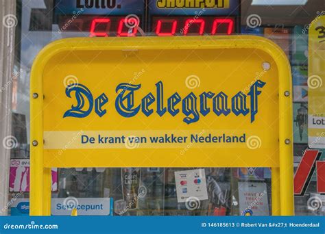 billboard selling de telegraaf newspaper  amsterdam  netherlands  editorial stock photo