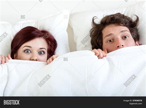 couple under sheet image and photo free trial bigstock