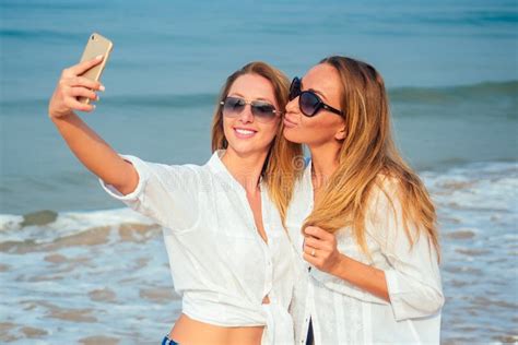 women  selfie  vacation   beach stock image image