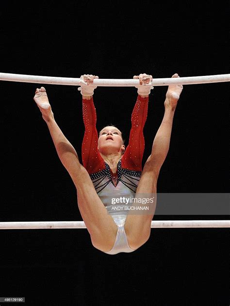 Us Gymnast Madison Kocian Performs On The Uneven Bars During Day One