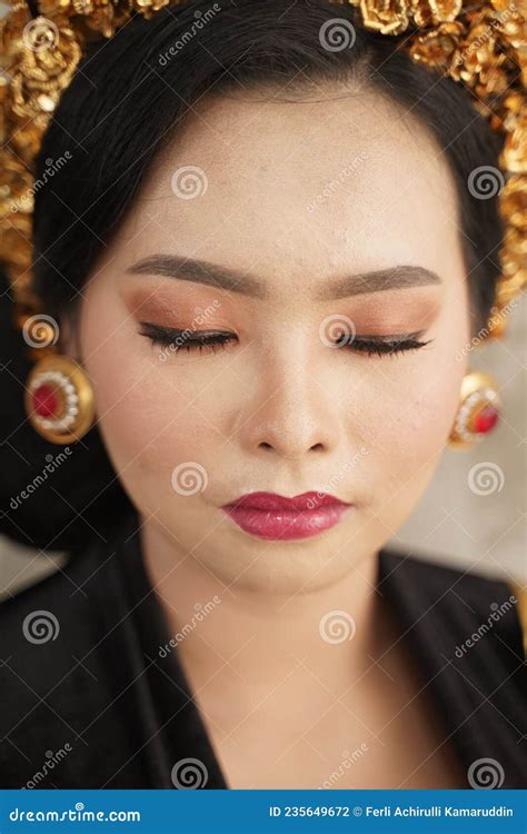Girl Closes Eyes Wearing Jewellery Payas Crown And Balinese Kebaya