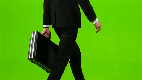 man holds  briefcase  stock footage video  royalty   shutterstock