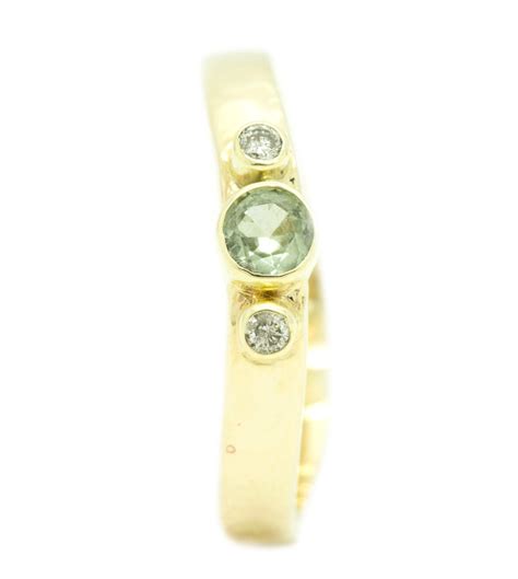 gouden ring met diamantjes en saffier handgemaakt fairtrade nanini jewelry handgemaakte