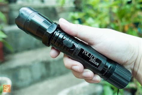 review police flashlight  stun gun taser protect  techbroll