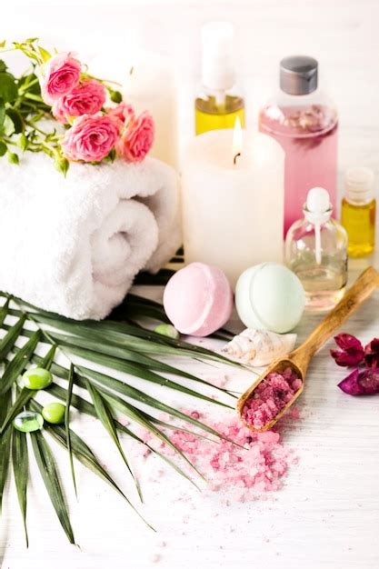 photo spa setting  pink roses  aroma oil vintage style