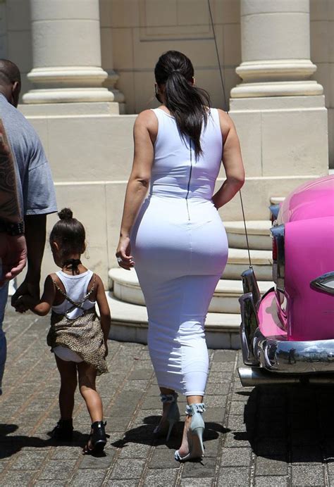 Stretched To The Limit Kim S Massive Butt Almost Rips Open Her Dress