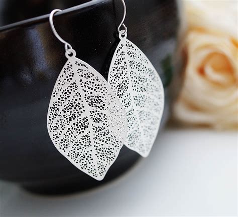 modern jewelry modern earrings matte rodium plated leaf earrings