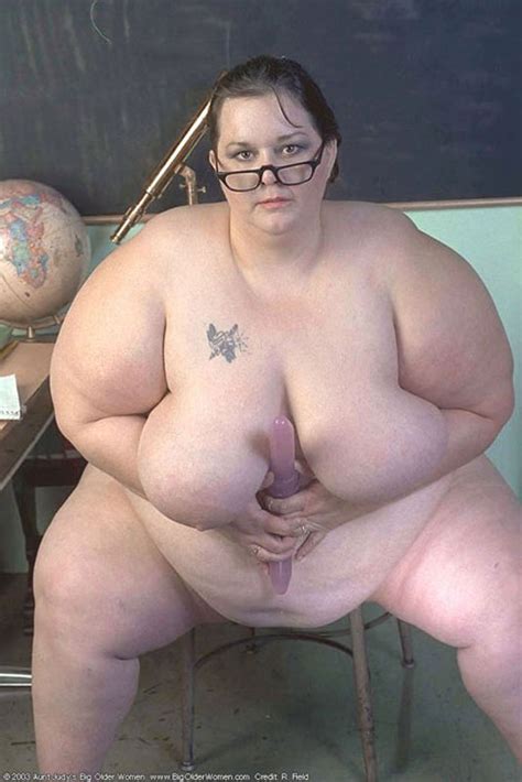 fat mature teacher stripping in the classroom