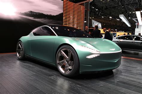 genesis mint concept   electric luxury car   city