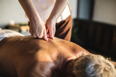 Female Message Therapist Giving A Massage At A Spa Morgan Massage
