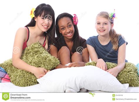 Pyjama Party Fun For Teenage Girls In Bed At Home Stock