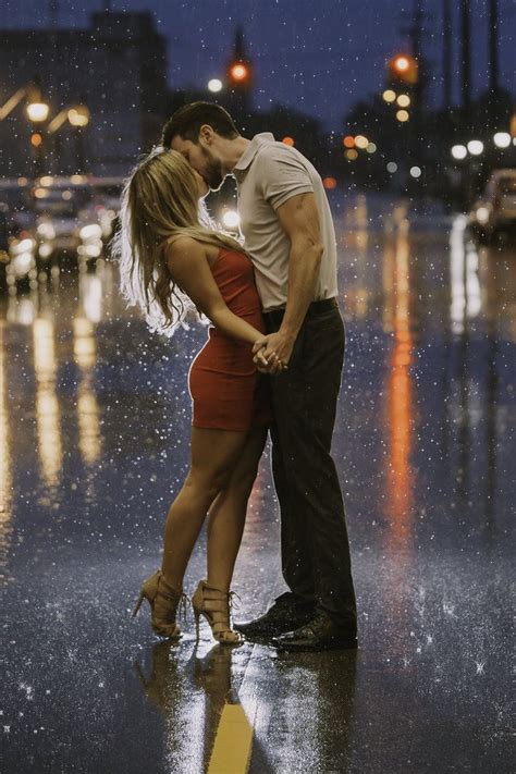 Romantic Hug And Kiss In Rain