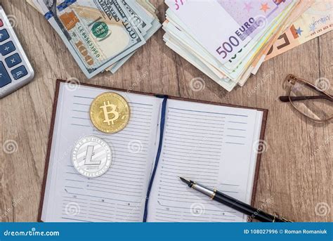 bitcoin litecoin dollar euro  notepad calculator stock photo image  internet market