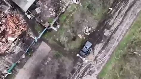 moment bomb  ukrainian drone flies  sunroof  russian soldiers vehicle sending