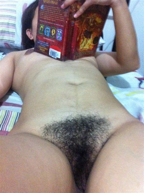 my hairy filipina wife shows pussy while reading in bedroom