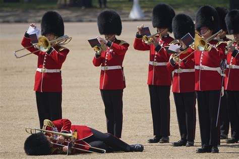 british royal guards faint due  heat  ceremony