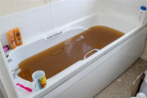 woman s bathtub fills with human poo and starts seeping through ceiling