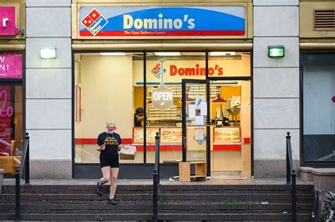 dominos posts upbeat results   menu items boost sales