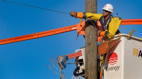 entergy urges public    distance  utility workers