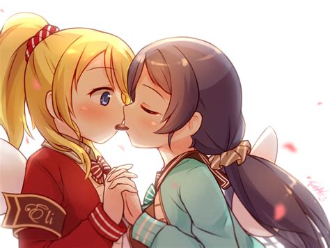 2girls ayase eri blonde hair blue eyes blush bow chocolate langbazi long hair love live school