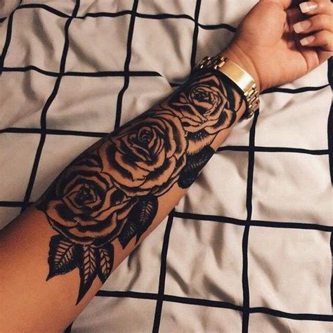 large rose tattoo   forearm