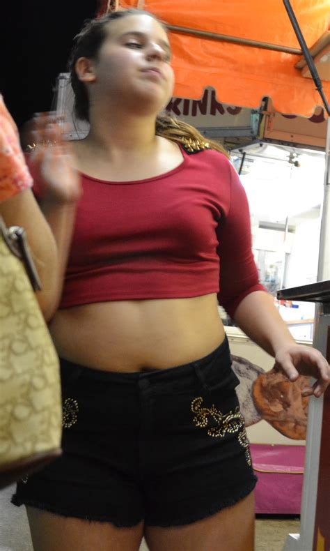 cute chubby teen showing her tummy