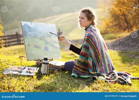 young artist painting  landscape royalty  stock photography