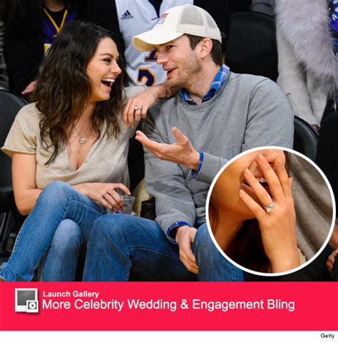 is that a wedding ring on mila kunis finger