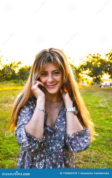 Portait Of Beautiful Young Woman At Sunset Young Girl Enjoys The