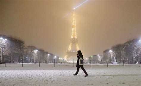 snow shuts eiffel tower  winter blast hits france  straits times