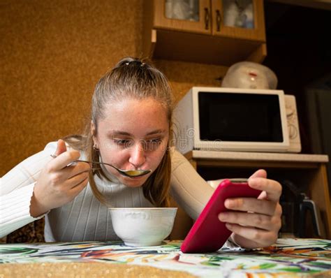 Teen Girl Eating Breakfast In The Kitchen Stock Image Image Of Woman