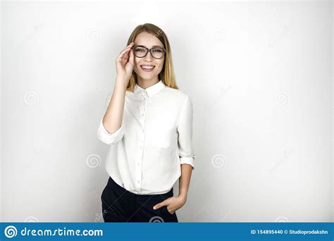 young beautiful smiling blonde business woman  eyeglasses  successful interview business
