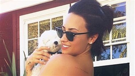 Demi Lovato Flaunts Fit Physique In Colorful Bikini