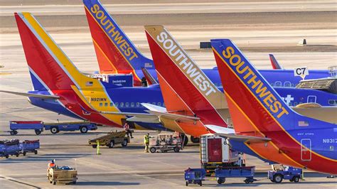 southwest passenger accused  wearing lewd top  forced  cover   captains  shirt