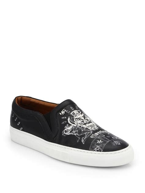 givenchy skull printed leather skate sneakers  black  men lyst