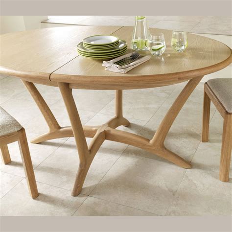 oslo light oak oval extending cm dining table