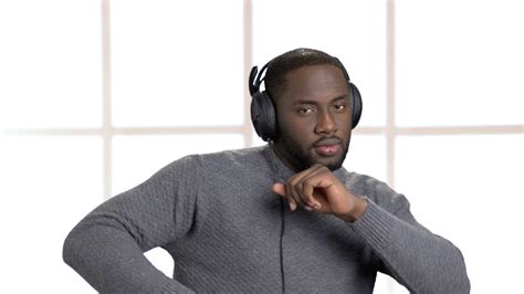 Handsome Man In Headphones Is Listening To Stock Footage Sbv 324244866