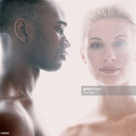 interracial couple profile of man woman facing camera portrait high res