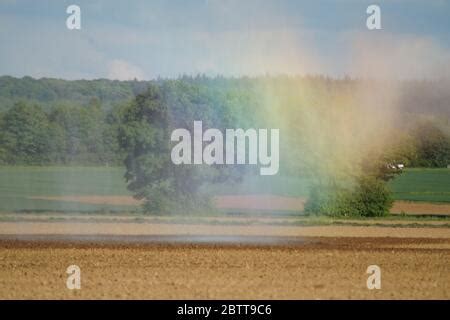 kuenstlicher regenbogen stock photo alamy