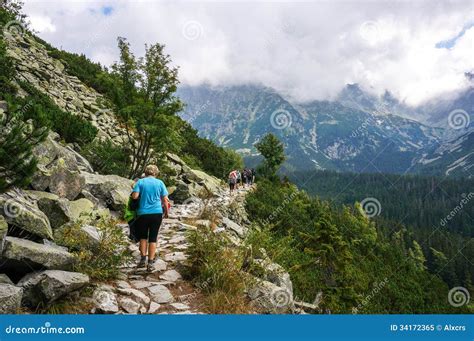 people hiking     path   summit  rysy  highest