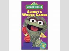 Sesame Street Slimey's World Games [VHS]: Carlo Alban