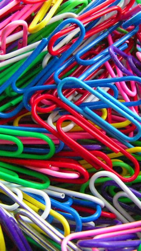 pile  colorful paper clips sitting