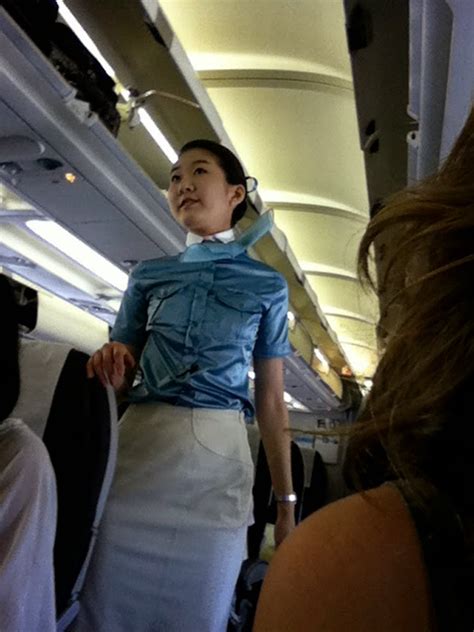 korean air hostesses serving with smile ~ world stewardess crews