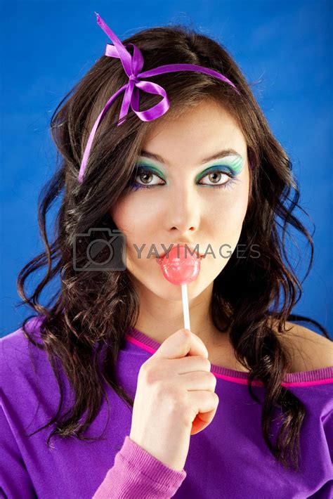 woman licking lollipop by vilevi vectors and illustrations with unlimited