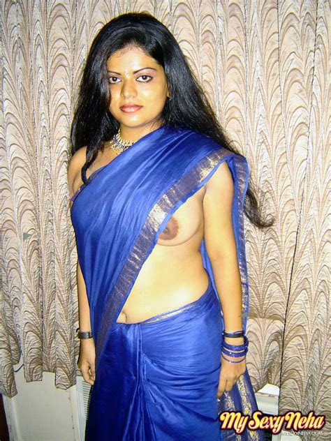 fantastic looking busty indian chick neha in blue saree and expose her asian porn movies