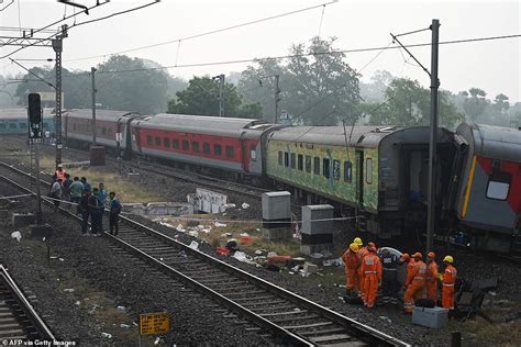 Rescuers Battle Through Wreckage To Help Survivors In India After Train