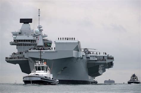 uks biggest warship hms queen elizabeth sails  portsmouth